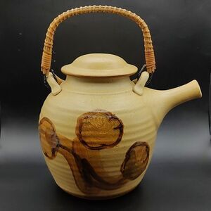 Vintage MCM California Art Pottery Teapot with a Woven Wicker Handle